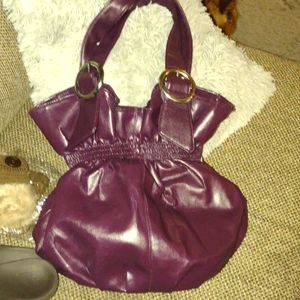 Cute purple handbag does have some wear is gently used super cute though